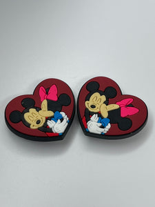 Mickey Kisses Minnie
